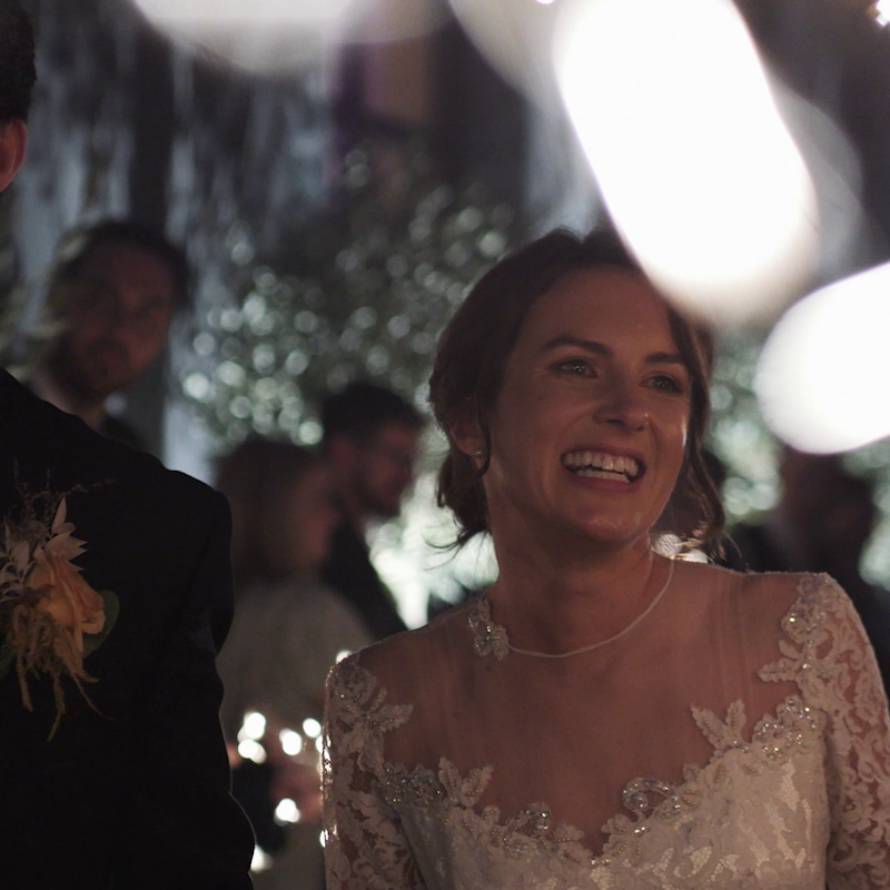 Bride walks through sparklers